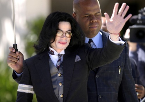 SANTA MARIA, CA - April 5: Michael Jackson waves as he leaves Santa Barbara County Courthouse after 