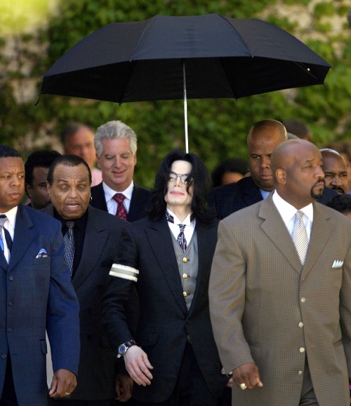 SANTA MARIA, CA - April 5: Michael Jackson and his entourage exit the Santa Barbara County Courthous
