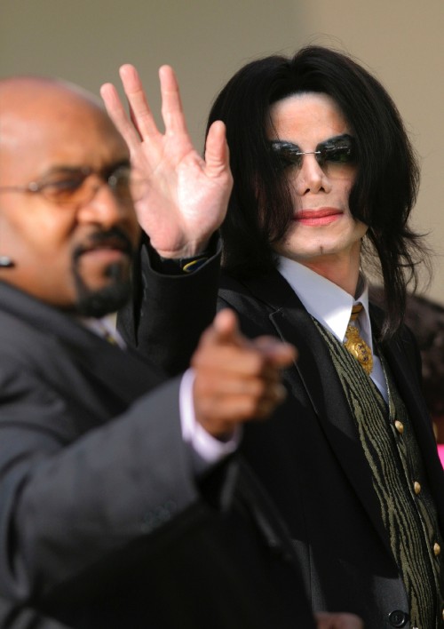 SANTA MARIA, CA - MARCH 23: Michael Jackson waves at fans as he enters the Santa Barbara County Cour