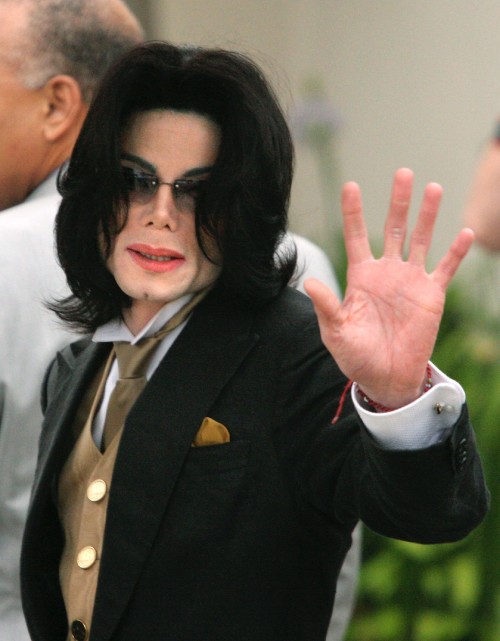 SANTA MARIA, CA - May 16: Michael Jackson waves to his supporters as he arrives outside the Santa Ba