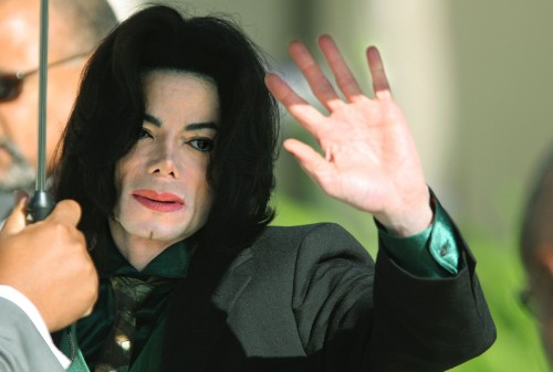 SANTA MARIA, CA - MAY 19: Michael Jackson waves to his supporters as he arrives outside the Santa Ba
